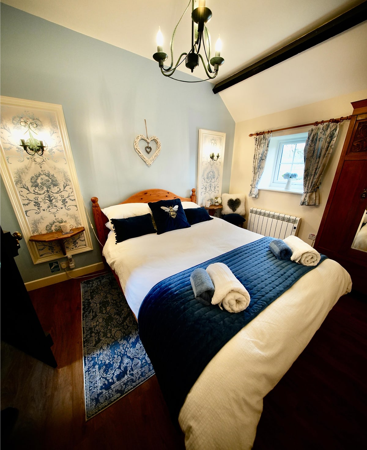 Plenty of space for up to four people, with a double bedroom and two single beds up in the eaves